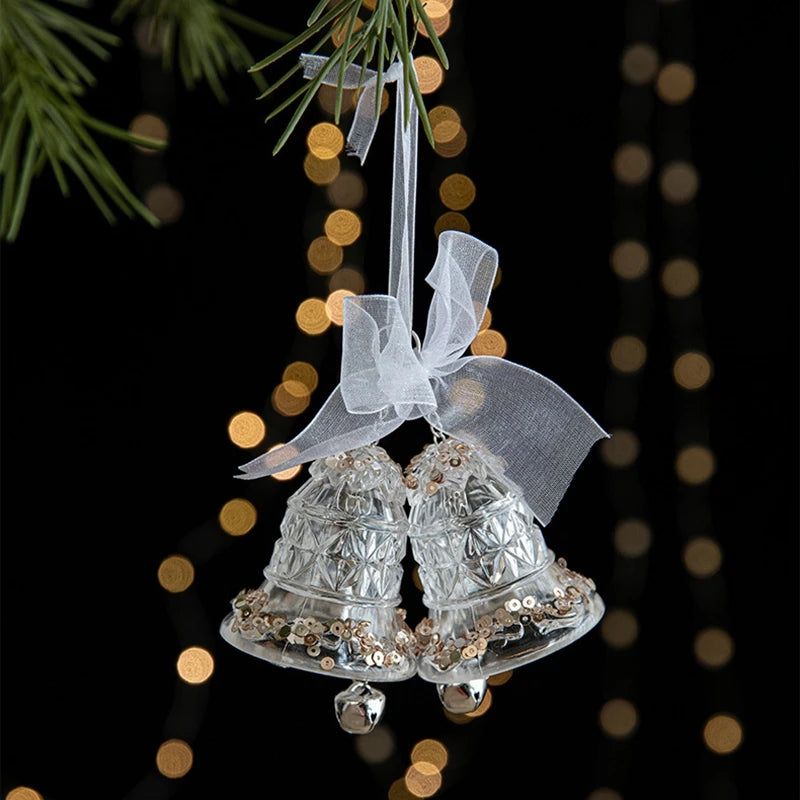 Par de sinos de Natal acrílico transparente com glitter dourado